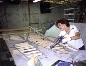 Joan is gluing the stabilizer ribs